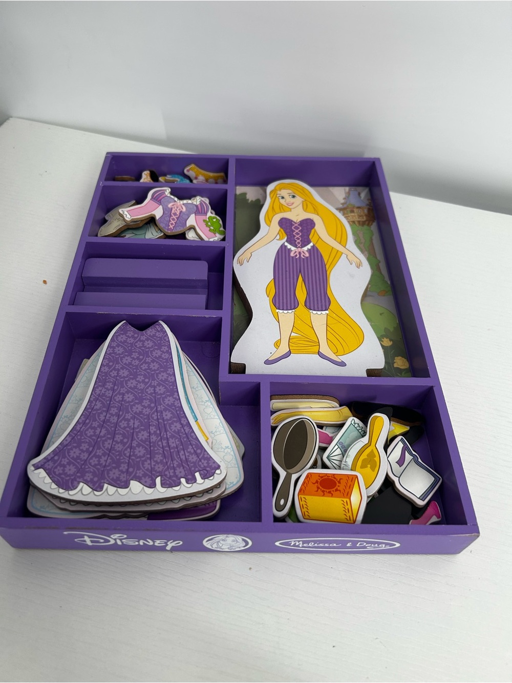 Melissa & Doug Disney Princess Rapunzel Wooden Magnetic Dress-Up Set Tray